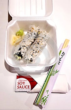 Sushi sticks box soy sause photo