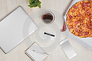 Food order pizza online internet concept on desk