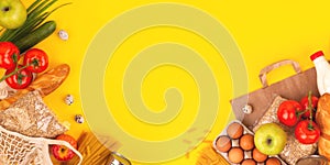 Food packaging on yellow background. Quarantine food delivery home. Flatlay banner with copyspace