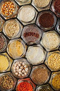 Food pattern background - beans and cereals in jars