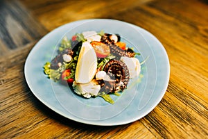 Food photo. Restaurant dishes on the wooden table.