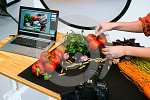 Food photography laptop advertisment stylist