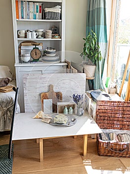 Food photography setup in a home studio with natural light, table, backdrop