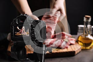 Food photography. Shooting of man holding raw ribs