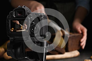 Food photography. Shooting of woman cutting pear bread