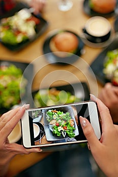 Food Photography On Smart Phone In Restaurant