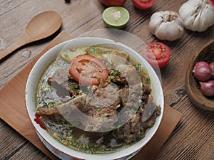 Sop Buntut or Sop Tulang Sapi, Indonesian Oxtail Soup photo