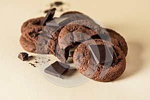 Food Photography of Sweet Double Chocolate Chip Cookies on Yellow Background Horizontal