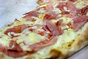 Food photos. detail of white-cut pizza without tomato