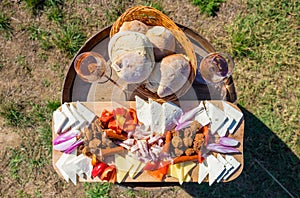 Food plate with traditional Eastern Europe food: onions, bread,