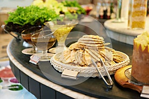 Food, platter and bread in restaurant buffet for catering service, selection and banquet for eating. Cafeteria, fine