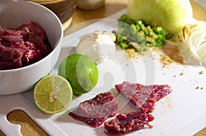 Food preparation, meat with condiments