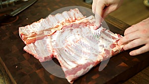 Food preparation, rack of pork ribs. Glazed, outdoor.