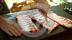 Food preparation, rack of pork ribs. Glazed, outdoor.