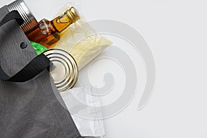 Food products in bag on white background. Food delivery, Donation, coronavirus