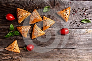 Food recipe background. Close up samosas, top view