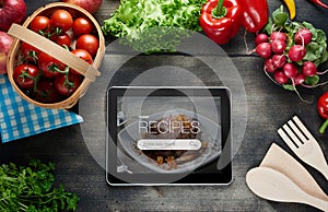 Food recipes on tablet computer photo