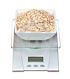 Food scale with oatmeal bowl electronic and digital isolated