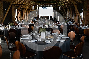 Food served on round table in a white hall during a Birthday corporate party in Eastern European Baltic Riga Latvia -