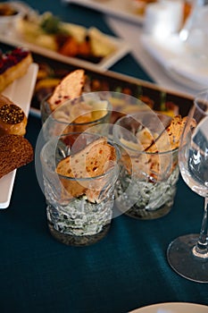 Food served on table in a white hall during a Birthday party in Eastern European Baltic Riga Latvia - Blue and teal