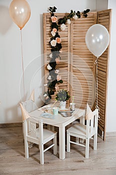 Food served on table in a white hall during a children Birthday party decoration in Eastern European Baltic Riga Latvia