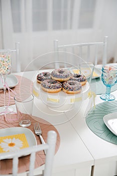 Food served on table in a white hall during a children Birthday party decoration in Eastern European Baltic Riga Latvia