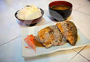 food set of roasted saba in teriyaki sauce, japanese rice and meso soup photo