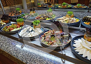 Food on the shelves in the self-service buffet with all inclusive in Turkey