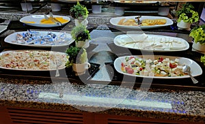 Food on the shelves in the self-service buffet with all inclusive in Turkey