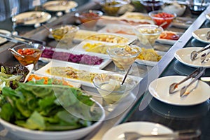 Food on the shelves in the self-service buffet. Food buffet in restaurant