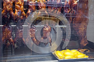 Food in shopping window of chinese restaurant in chinatown manha