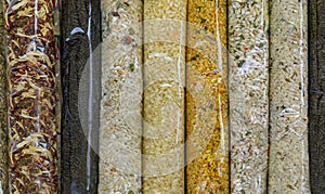 Food souvenir selection of prepackaged bags of rice for risotto with different flavors at a market in Venice, Italy