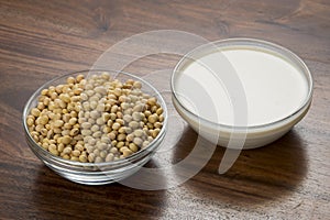 Food : Soybeans and Soy milk on Wooden Background