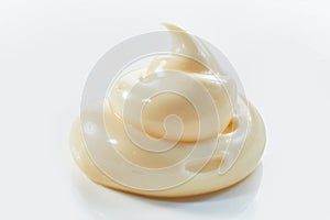Food styling concept with twirled mayonnaise photo