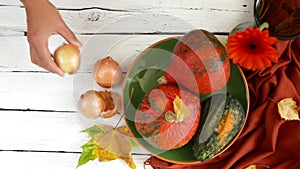 Food stylist works with Autumn table composition