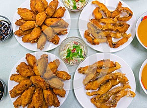 Food Variety Table top Fried chicken Fried fish roasted pork papaya