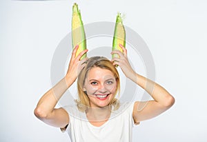 Food vegetarian and healthy organic product. Harvesting and fun. Vegetarian nutrition concept. Woman hold yellow corn