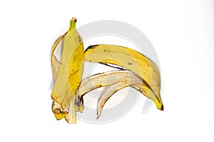 Food waste bananas on a white background. Top view. Flat lay. Waste for recycling. Responsible disposal of household food wastage