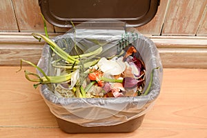 Food waste in a kitchen leftover vegetables can be composted and disposed of in an eco friendly way photo