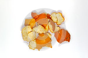 Food waste tangerine on a white background. Isolate. Close up. Waste for recycling. Responsible disposal of household food wastage