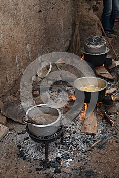 food on wood fire in a traditional african kitchen