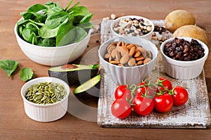 Foods containing potassium on wooden table photo