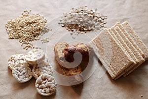 Foods high in carbohydrate. Healthy eating, diet concept. Bread, rice cakes, brown rice, oats.