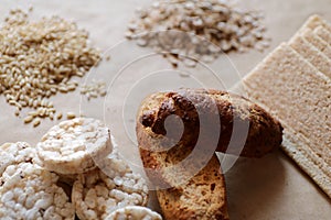 Foods high in carbohydrate. Healthy eating, diet concept. Bread, rice cakes, brown rice, oats.