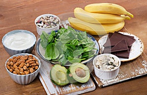 Foods High in Magnesium on a wooden table.