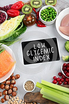 Foods with low glycemic index on gray background