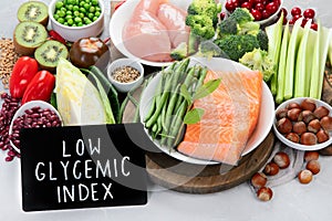 Foods with low glycemic index on gray background