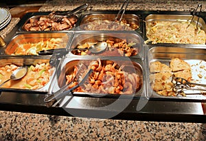 Foods in the tray of an all-you-can-eat self-service restaurant