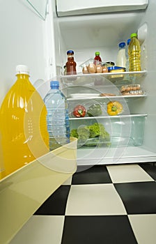 Foodstuffs in fridge. photo