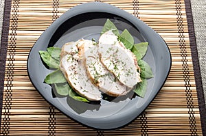 Foodstyle background top view with baked slices of chicken meat